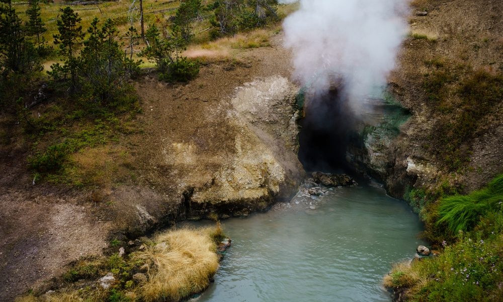 Steam,Exits,Dragon's,Mouth,Spring,In,Yellowstone,National,Park.